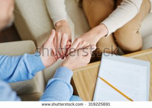 stock-photo-close-up-of-female-hands-in-those-of-man-319225691
